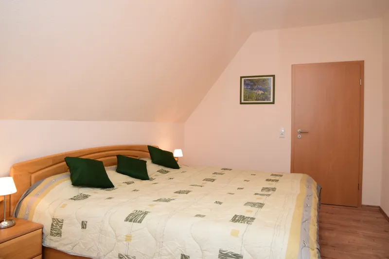 Ferienwohnungen am Stadttor - Schlafzimmer Doppelbett