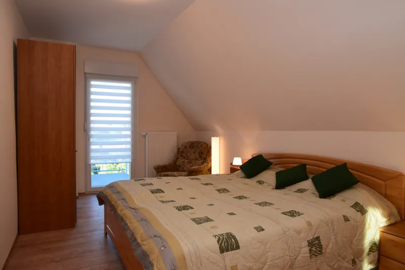 Ferienwohnungen am Stadttor - Ferienwohnung Anneliese - Schlafzimmer mit Doppelbett